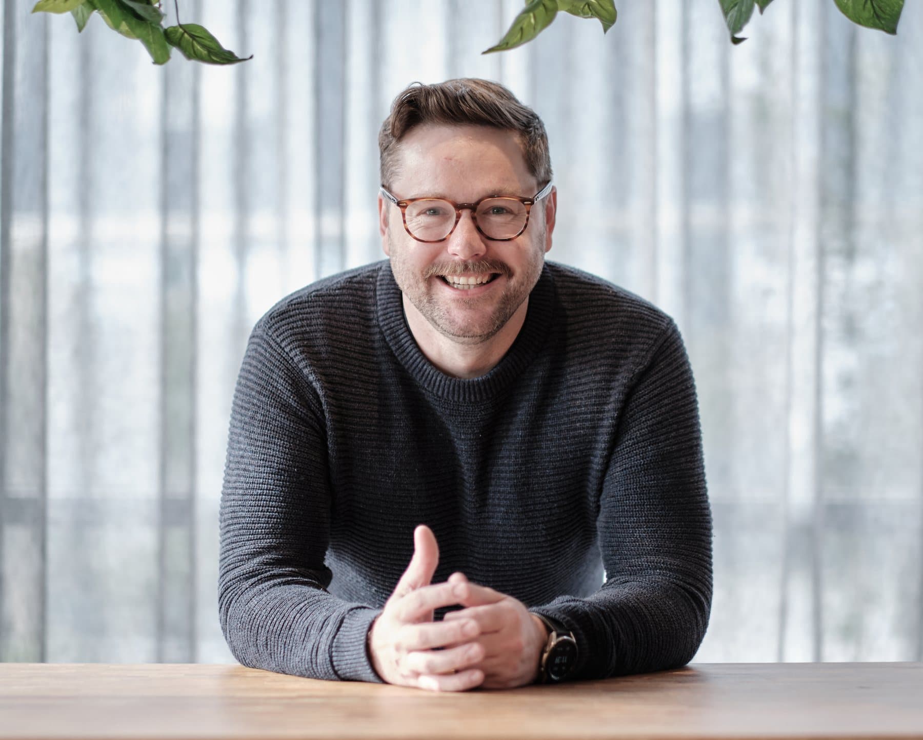 Kieren Hoolihan seated at a table